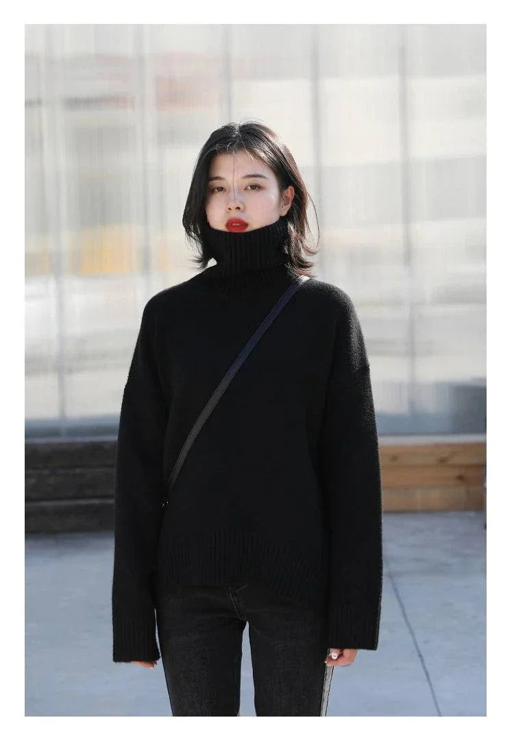 Women's black loose turtleneck pullover sweater knitwear for autumn and winter.