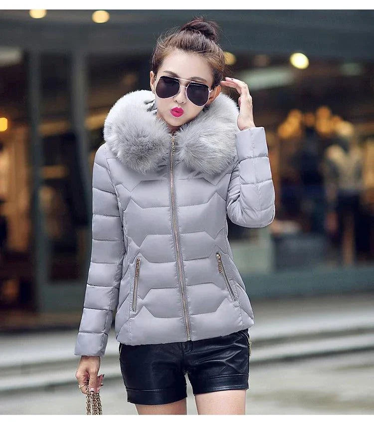 2024 artificial raccoon fur collar winter jacket for women, stylish and cozy parka for winter fashion.