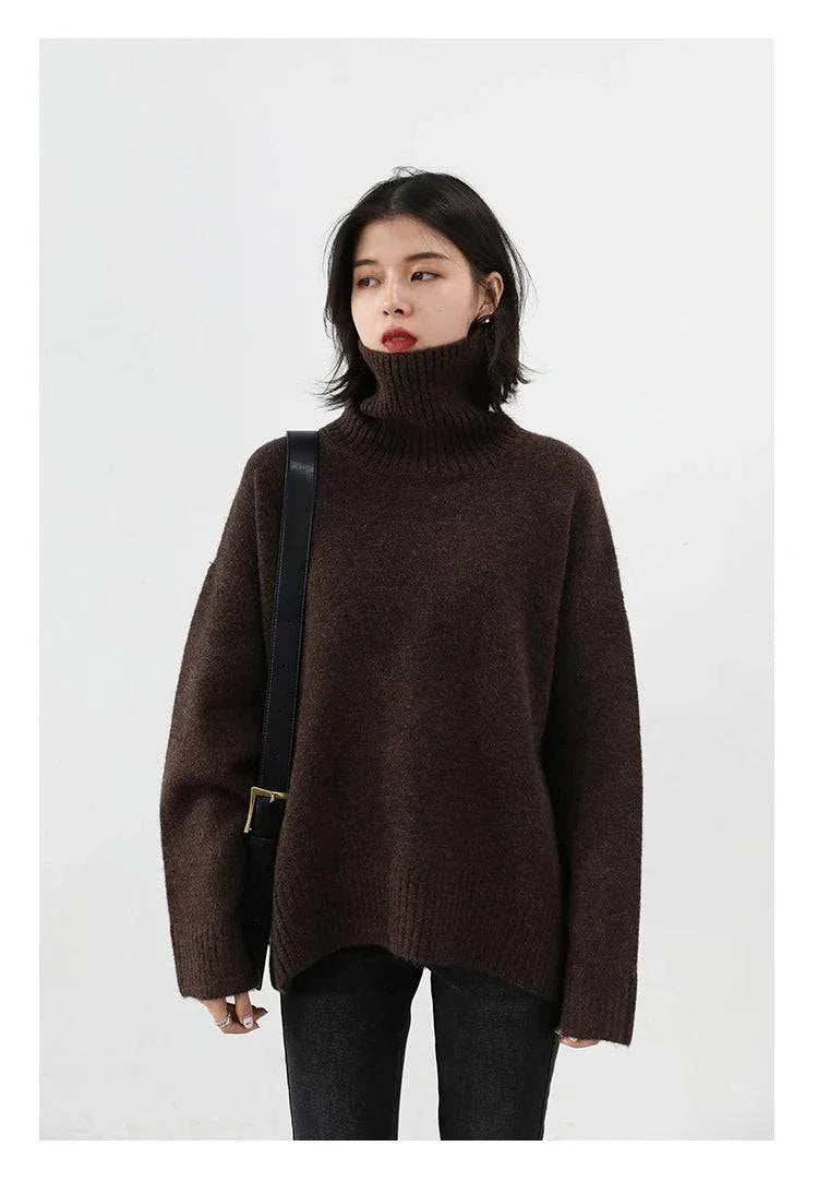 Women's loose turtleneck pullover sweater in solid brown knit, ideal for autumn and winter wear.