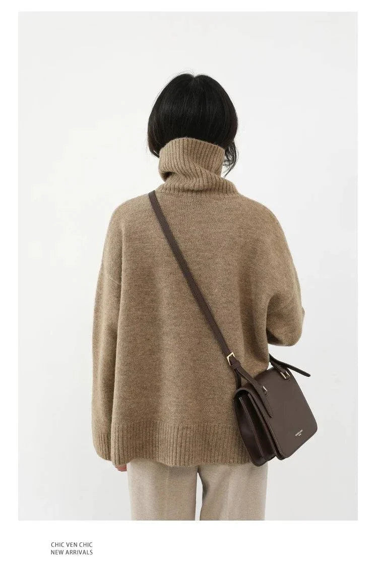 Women's loose turtleneck pullover knitwear, cozy solid sweater for autumn and winter.