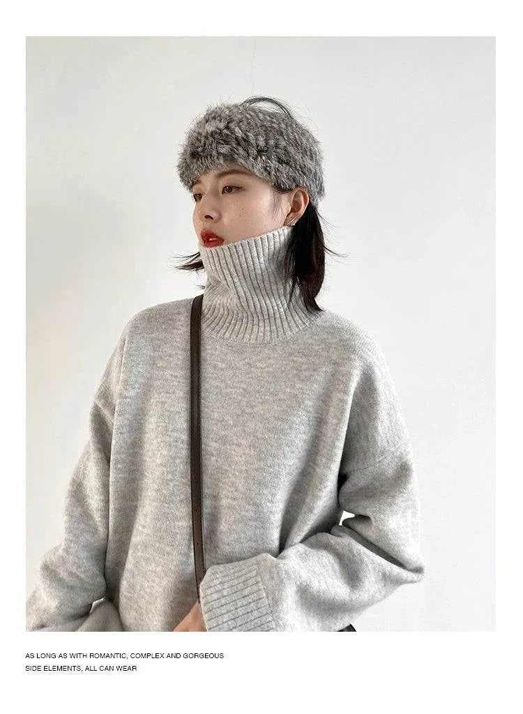 Women's loose turtleneck pullover sweater, soft knit fabric, chic oversized design, perfect for autumn and winter.