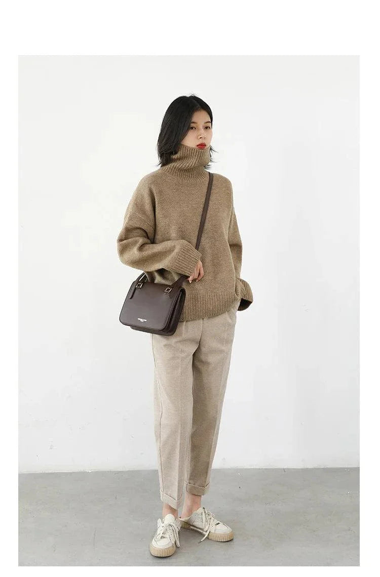 Women's loose turtleneck pullover knitwear, warm solid sweater for autumn and winter.