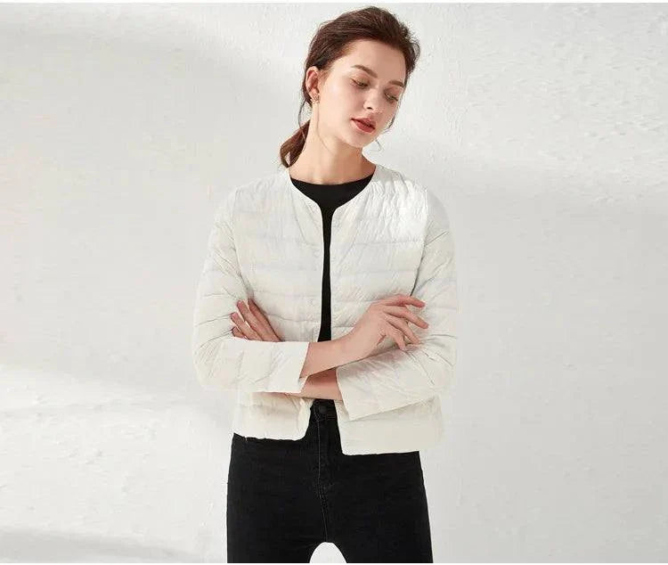 Ultralight warm women’s white puffer jacket with O-neck design.