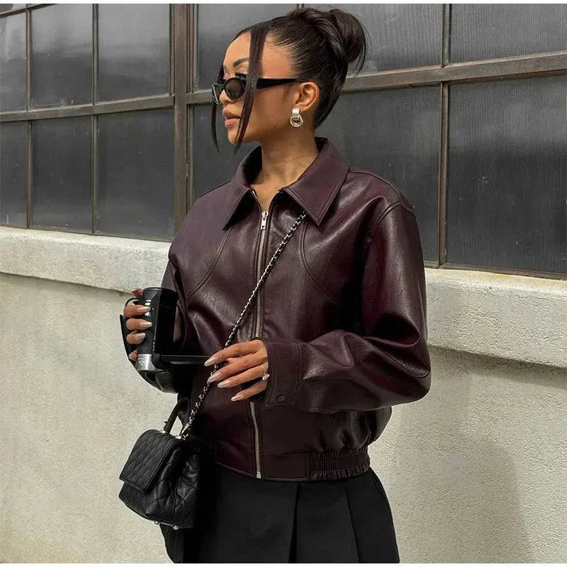 Vintage lapel leather jacket for women with long sleeves and pockets, perfect for autumn fashion streetwear.