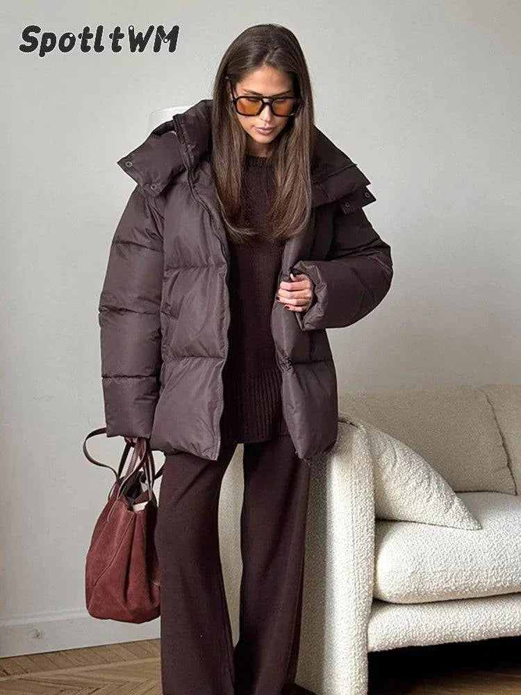 Vintage brown hooded cotton padded coat for winter fashion.