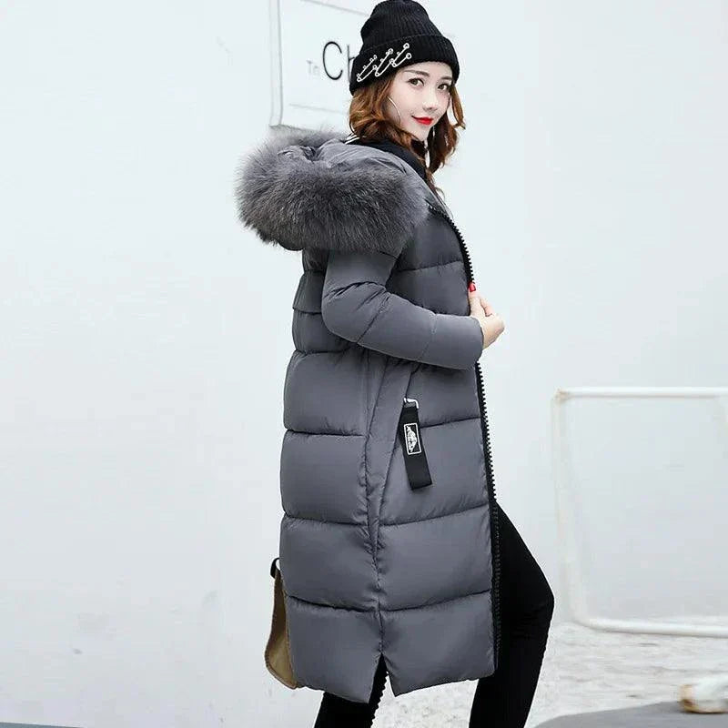 Winter fashion fur collar hoodie parka for women with zipper, bubble puffer style, casual cold-weather jacket.