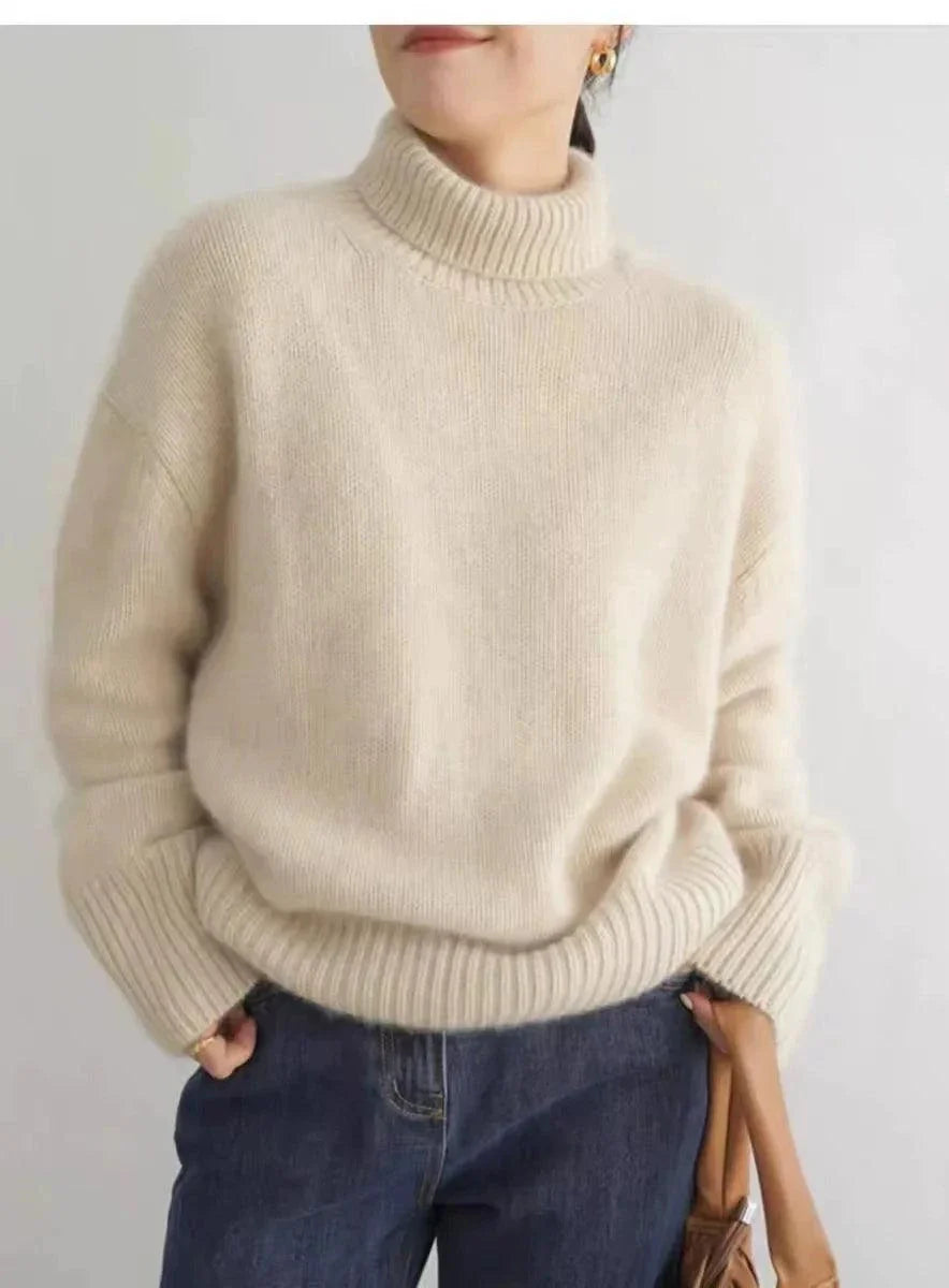 100% Pure Cashmere Women's Loose Turtleneck Sweater in beige, perfect for winter warmth and elegance.