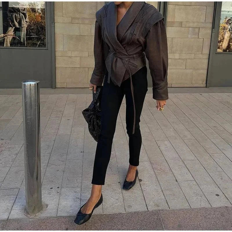 Vintage lapel leather jacket for women with long sleeves, chic style, solid color, featuring lace-up details and pockets, perfect for autumn streetwear.