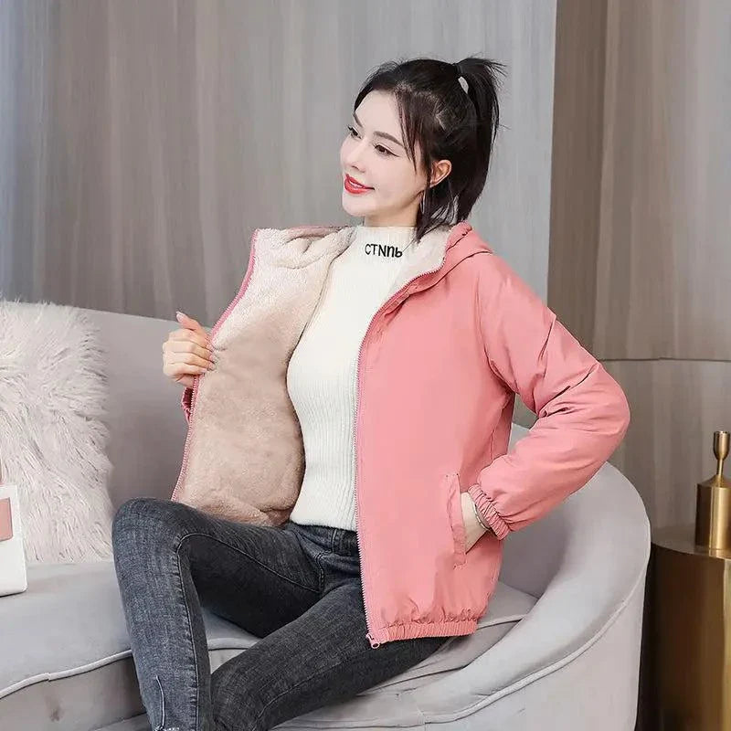 Women's winter fleece hooded jacket, pink, cozy and windproof for casual outdoor wear.