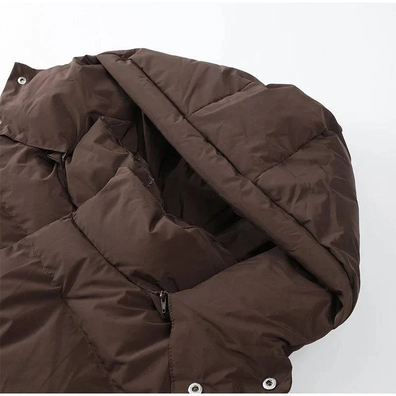 Vintage brown hooded cotton padded coat with long sleeves and front zipper closure.