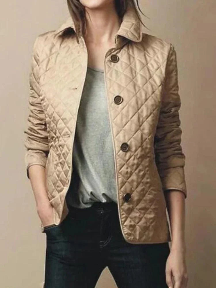 Quilted winter coat for women with turn-down collar and single-breasted design.