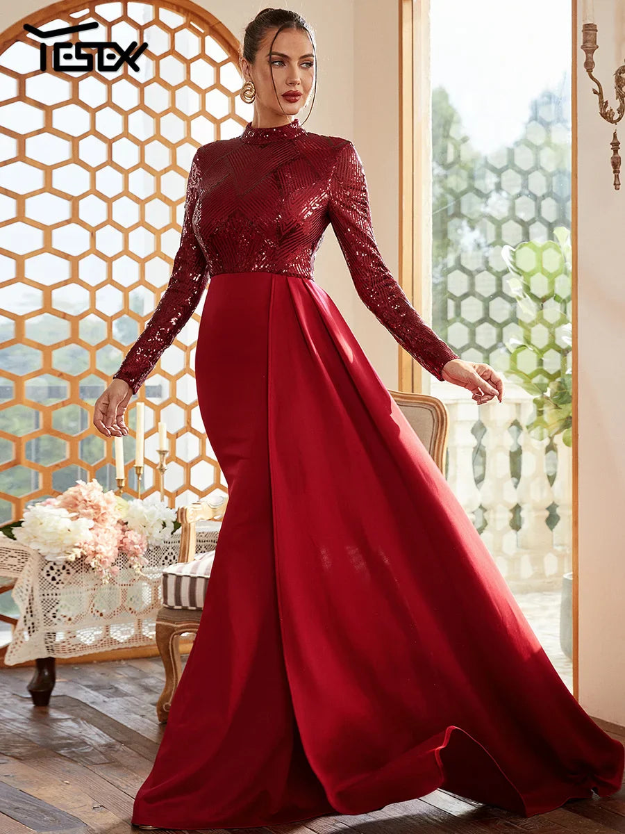 Elegant A-line sequin prom dress with long sleeves and draped detailing in red.