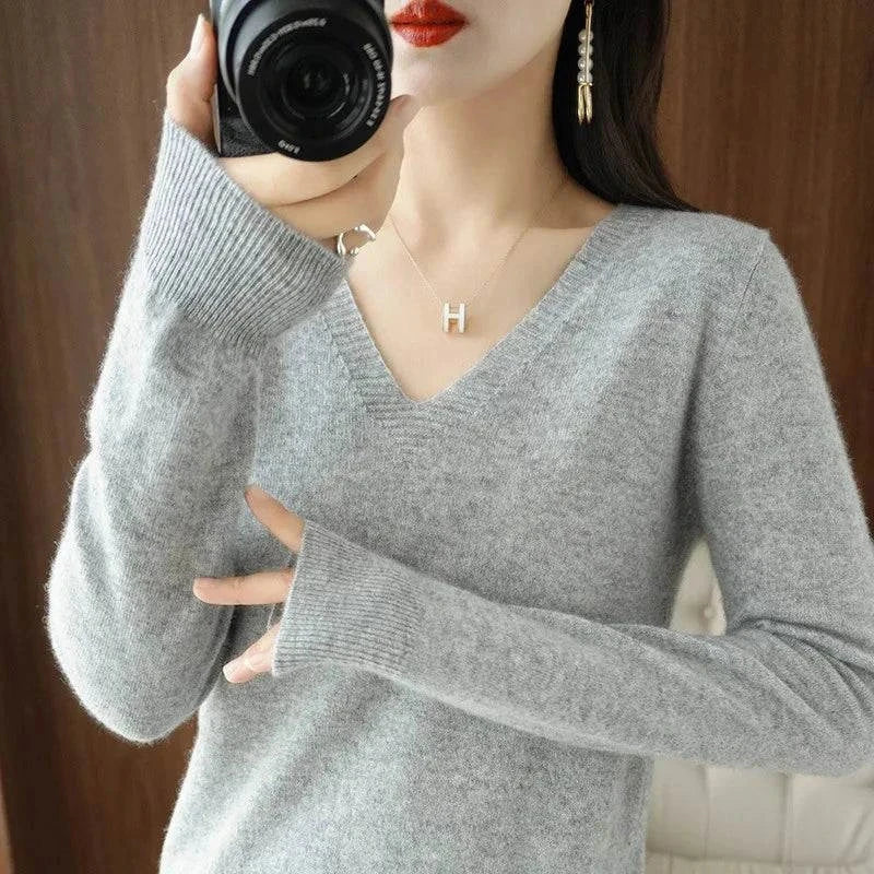 Cashmere women's V-neck sweater with long sleeves, featuring a hollow-out design for casual elegance.