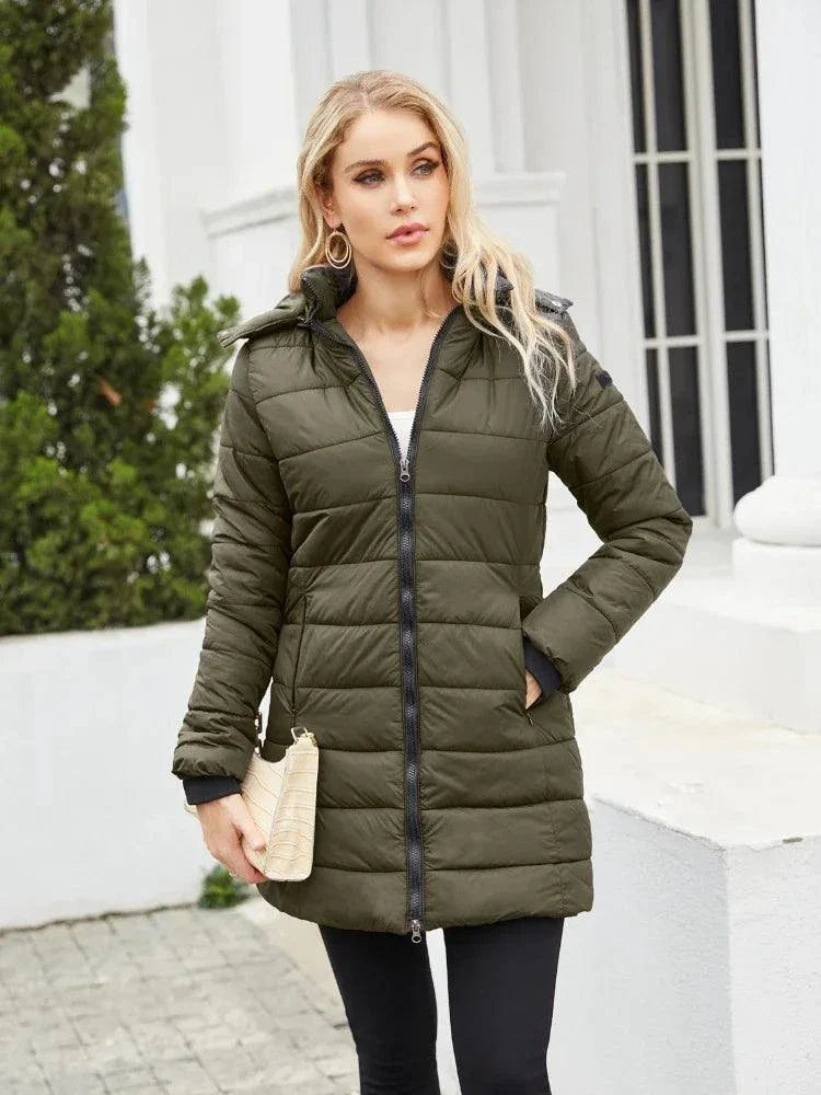 Women's waterproof parka with detachable hat and long sleeves for autumn and winter.