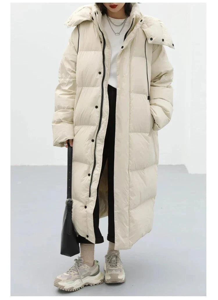 Women's Korean loose hooded long down coat, thick and warm, in a stylish winter design.