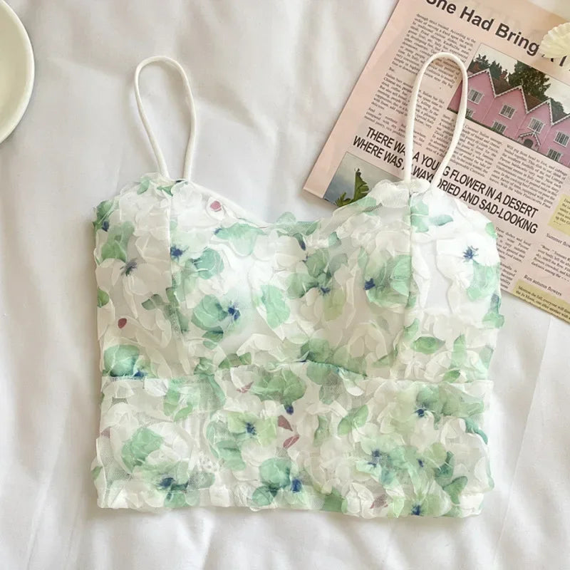 Sweet floral lace corset crop top with floral design and sleeveless cut on a white background.