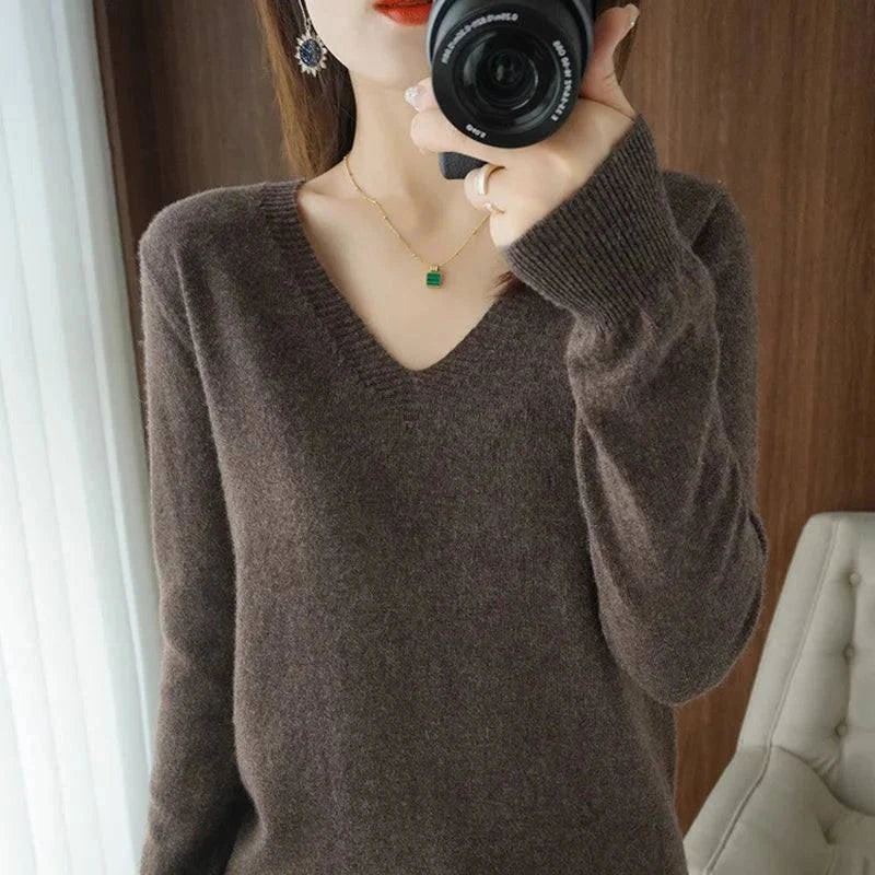 Cashmere Women's V-Neck Pullover Sweater with Long Sleeves and Lace Neck Detail.