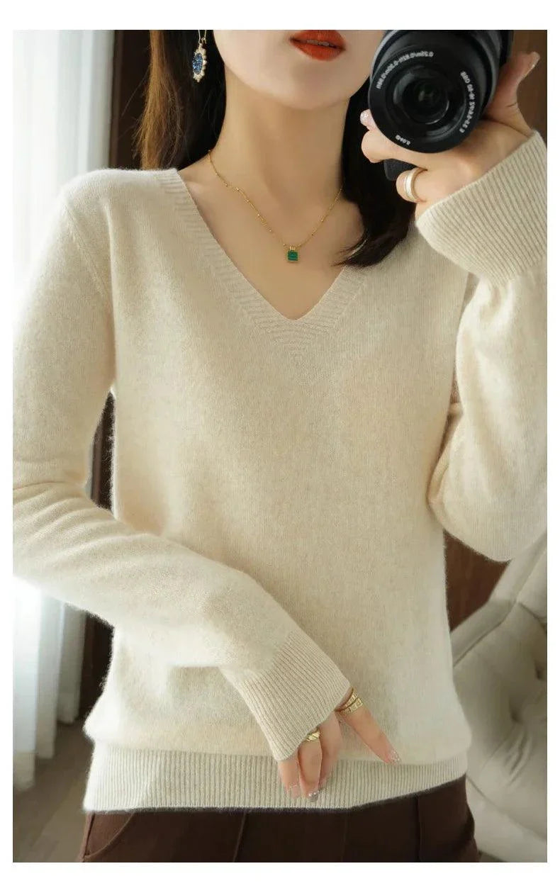 Cashmere women's V-neck pullover sweater with intricate lace, casual elegance, knitted long sleeve design.