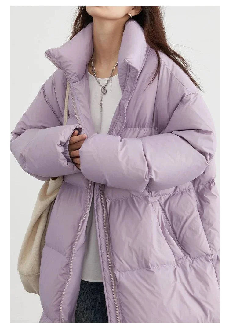 Women’s long down coat in lavender, thick and warm, ideal for casual wear in autumn/winter 2023.