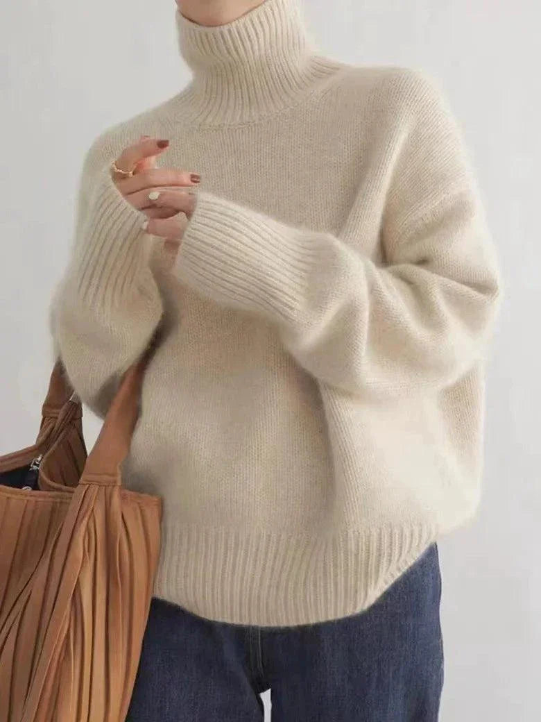 Women's cashmere turtleneck sweater, loose fit, winter wool jumper.