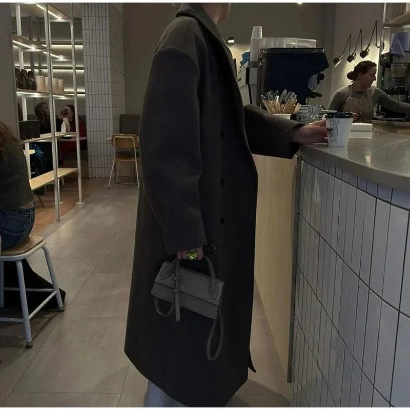 Fashion Women Overcoat - Double Breasted Autumn Winter Jacket in a coffee shop setting.