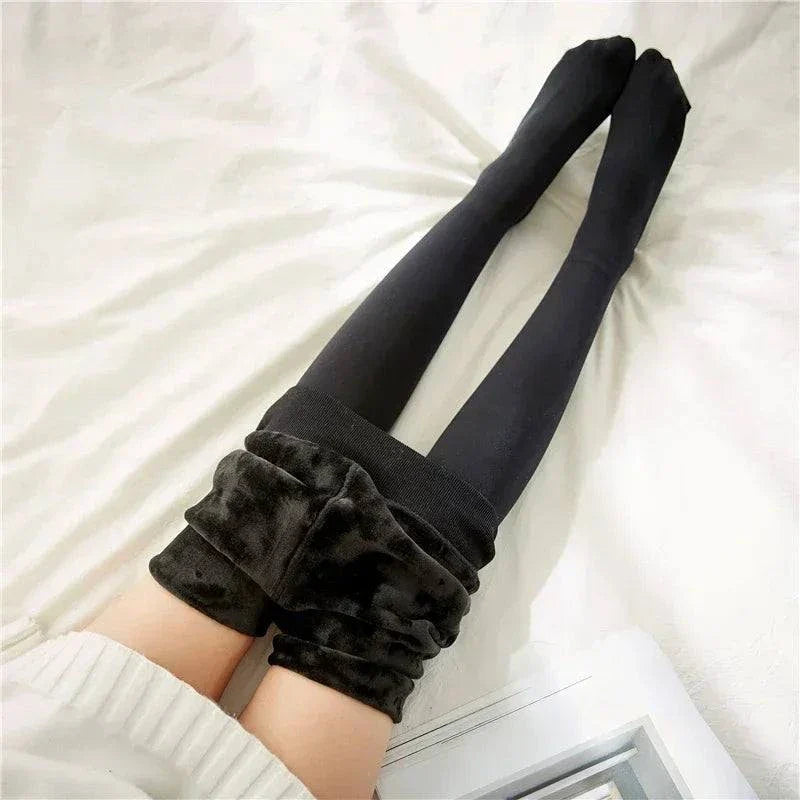 Women's thermal stockings with fleece lining for winter warmth and comfort, featuring high-waist design in black.