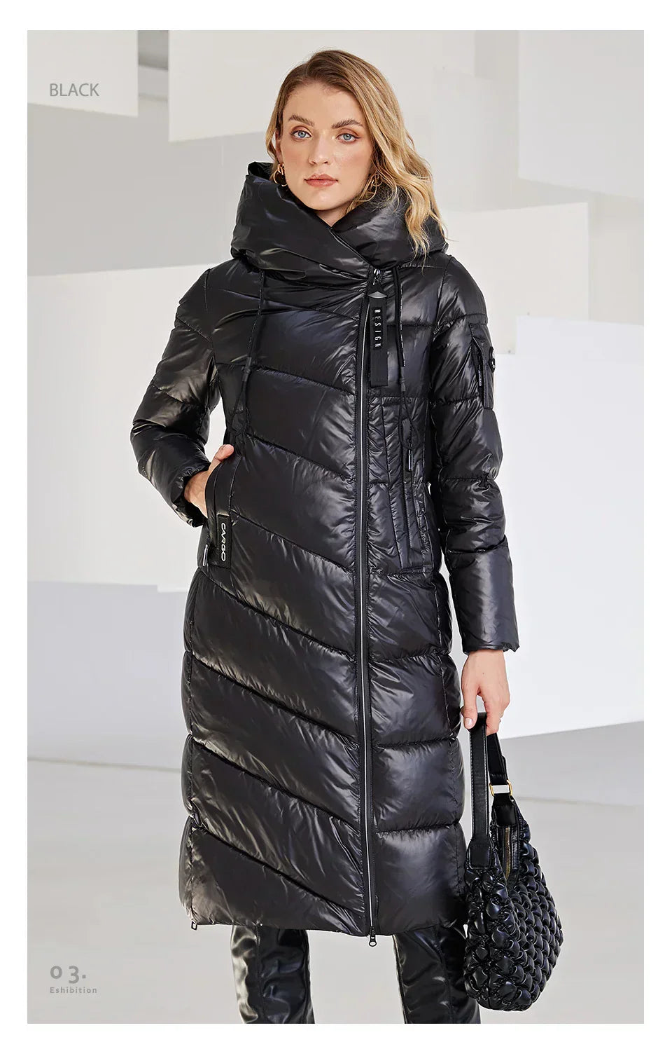 Women's black winter jacket, long and quilted, warm, windproof, hooded, slim fit style.