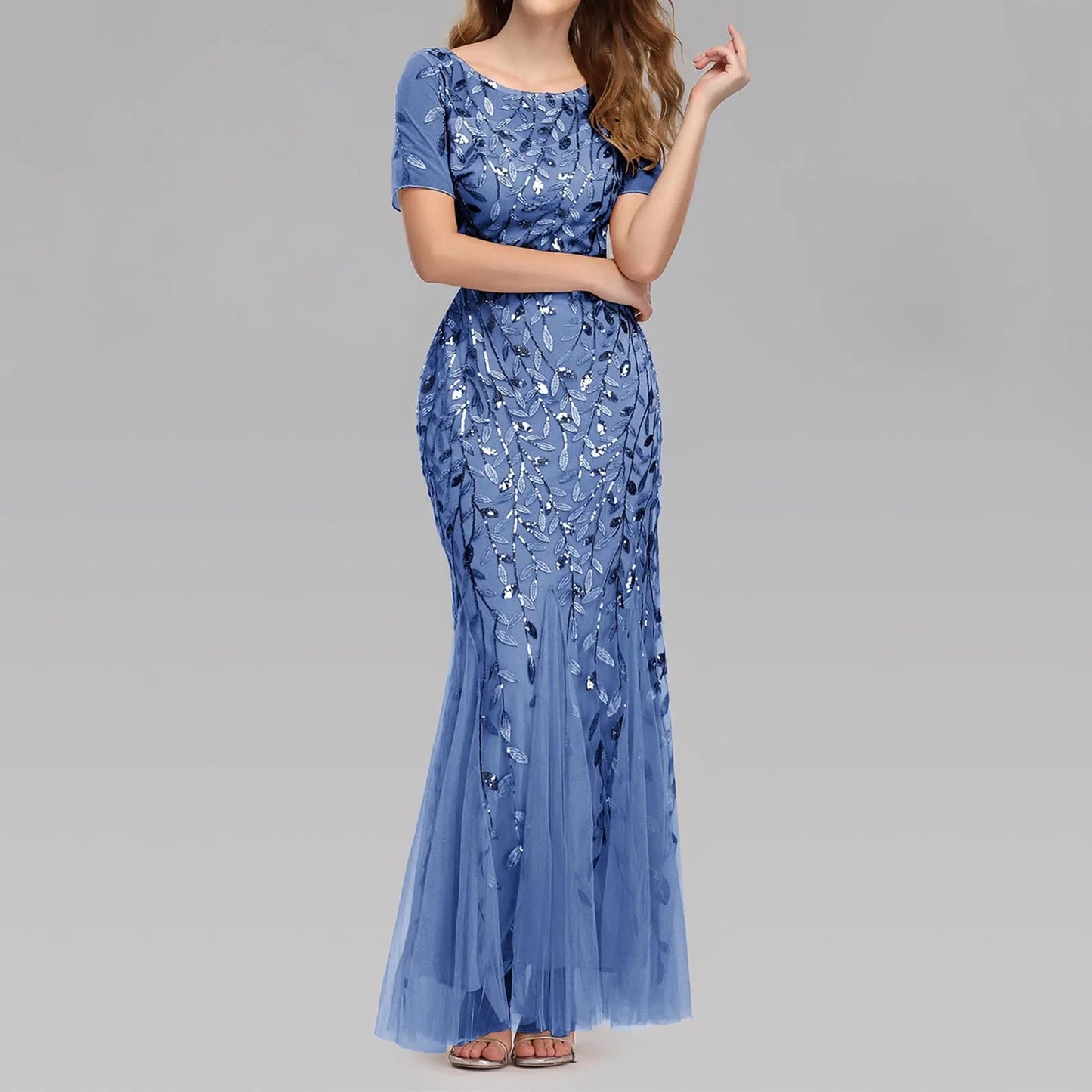 Elegant Luxury Sequin Mesh Evening Maxi Dress with floral glitter pattern, round neck, and sleeveless design.