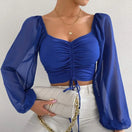 Switch Chic summer V-neck crop tee with drawstring and sheer sleeves in blue. 2 image