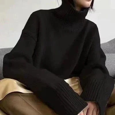 Women's loose turtleneck sweater in pure cashmere, winter wool jumper style.