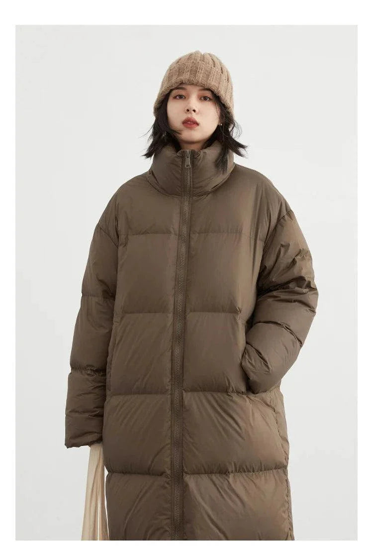 Women's long down coat, thick and warm, casual fit, brown color, autumn winter 2023.