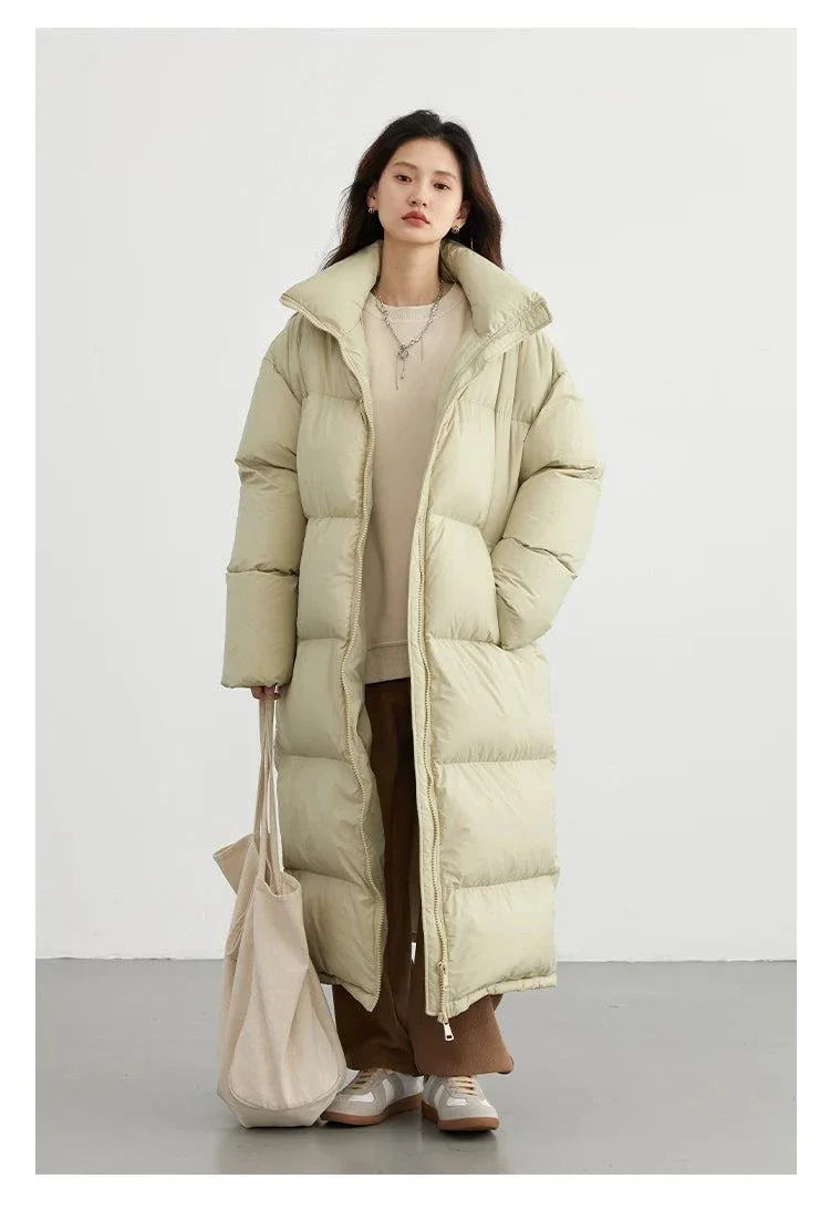 Women’s long down coat, thick and warm, casual fit for autumn winter 2023, featuring premium white duck down filling and solid color design.