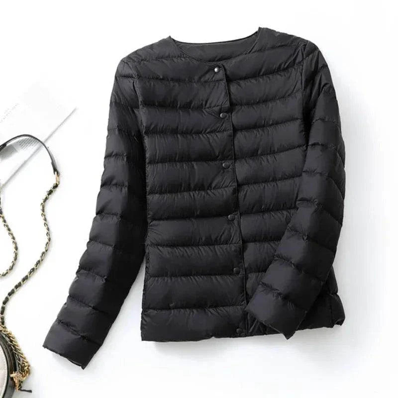 Ultralight warm women’s puffer jacket, collarless O-neck design, black, ideal for layering in spring and winter.