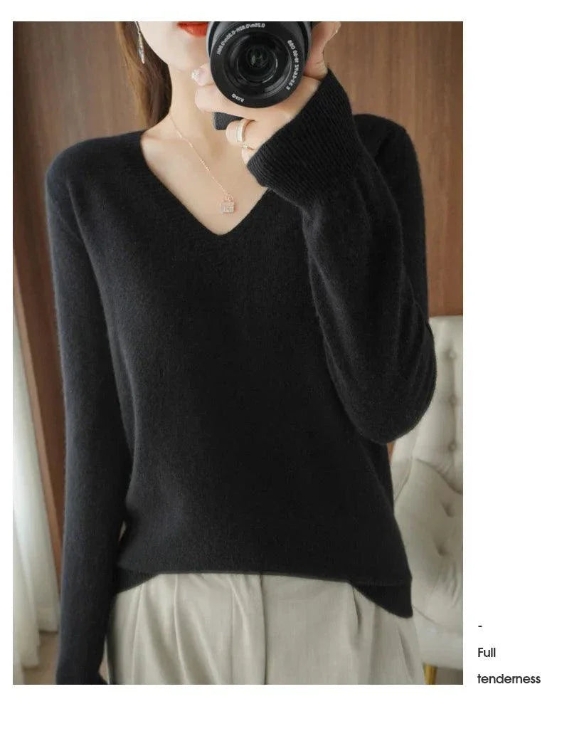 Cashmere women's V-neck pullover sweater with long sleeves and lace detailing.