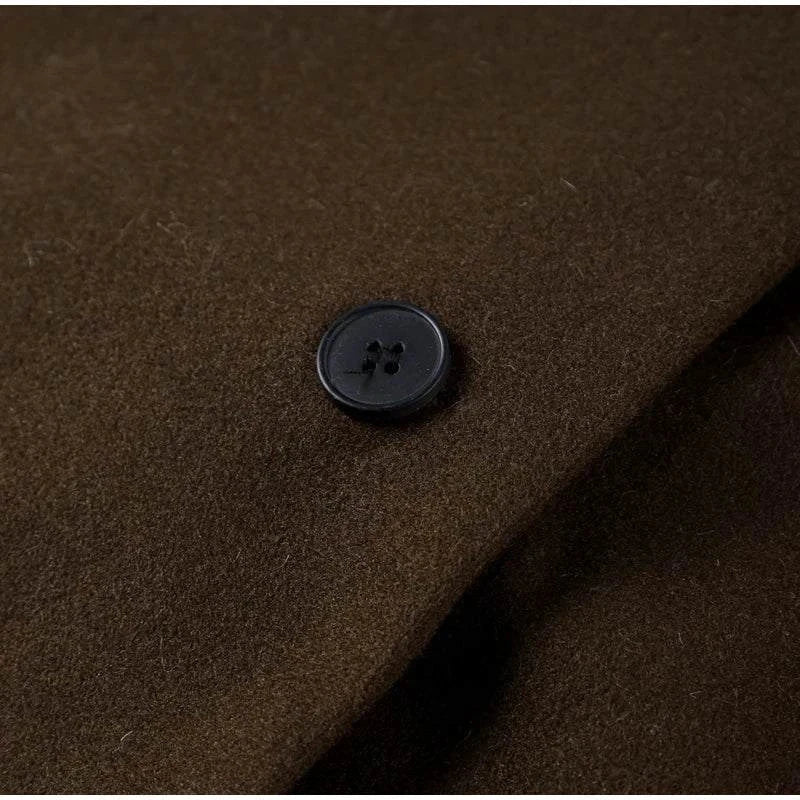 Brown wool blend fabric with black button detail on a double-breasted women's overcoat, ideal for autumn and winter.