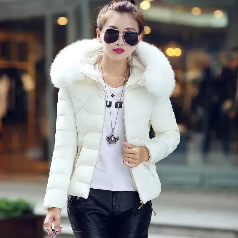 2024 Artificial raccoon fur collar winter jacket for women in white, featuring a stylish and cozy design.