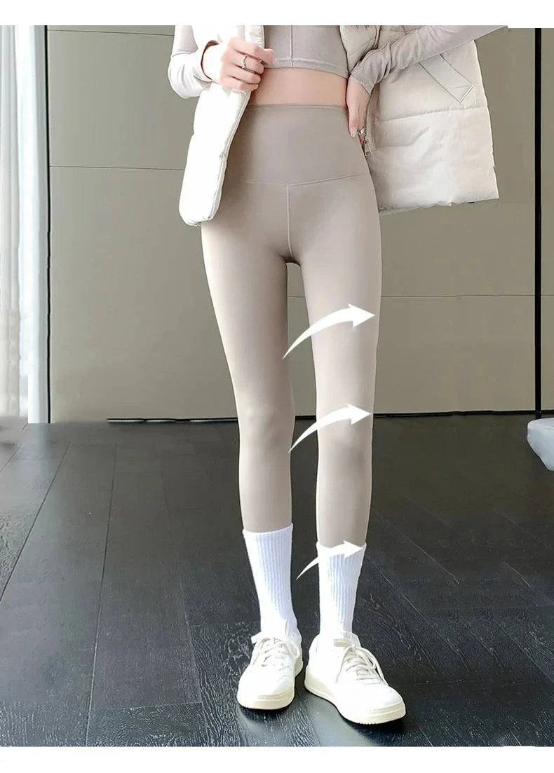 Women's high waist thin rabbit fleece shark leggings for winter warmth and style.