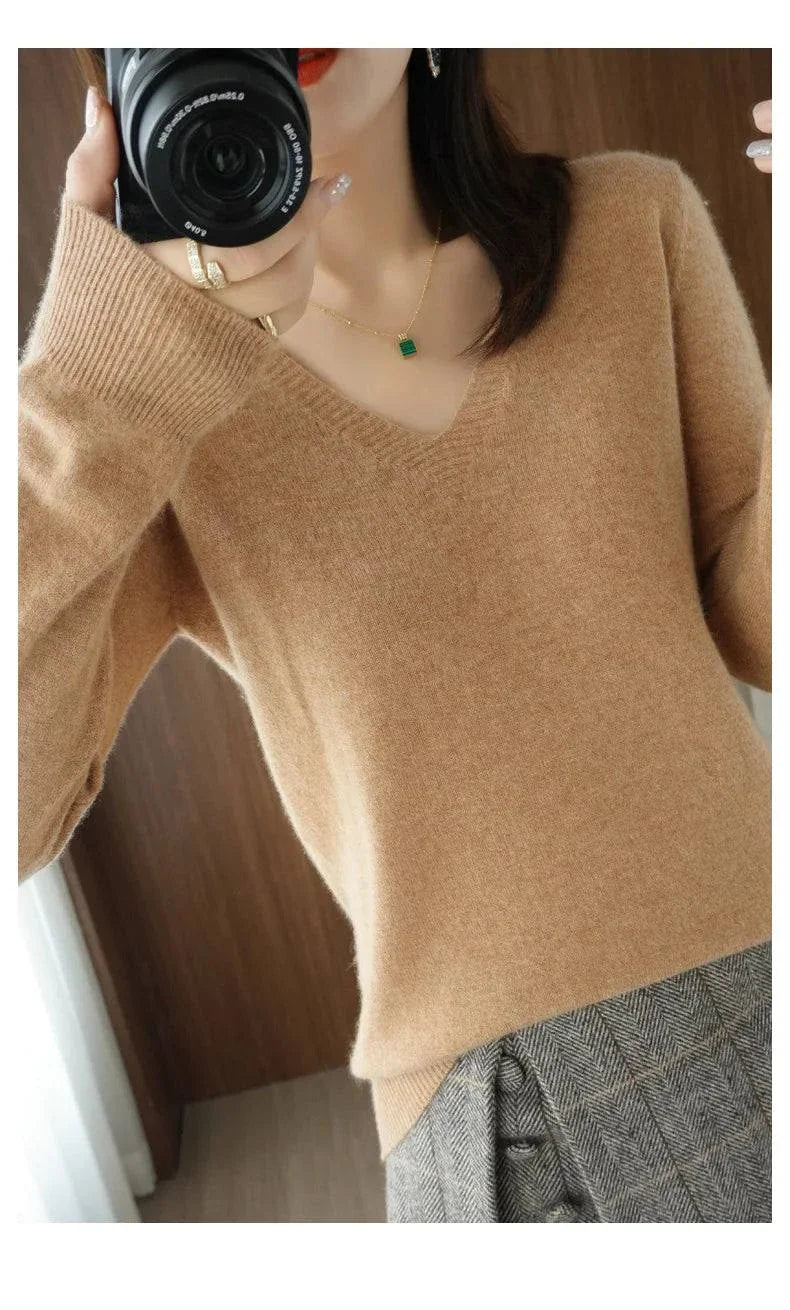 Cashmere women's v-neck pullover sweater with lace detailing, perfect for casual elegant looks.