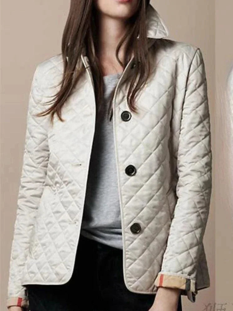 Quilted winter coat for women with single-breasted design and turn-down collar.