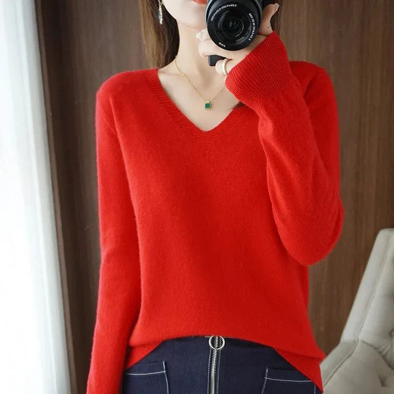 Cashmere women's V-neck pullover sweater in red, casual elegance with long sleeves.