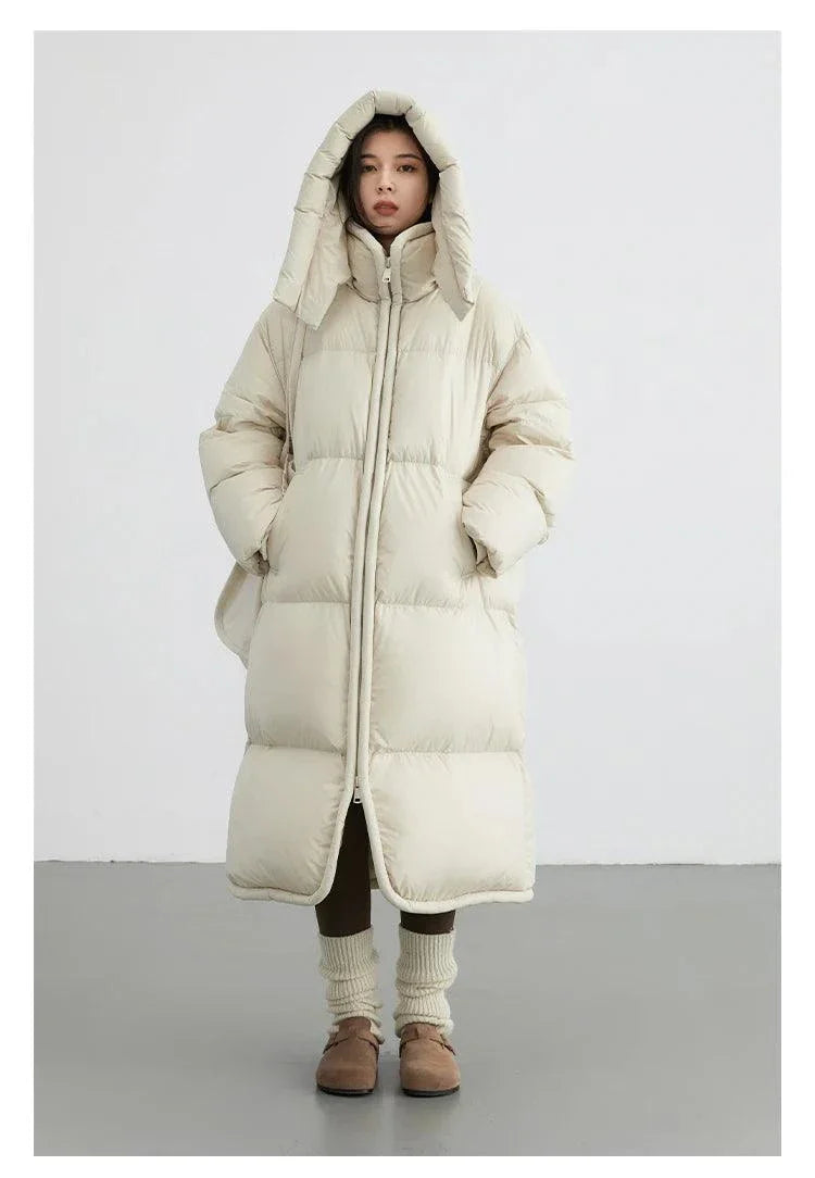 Women's long down coat with detachable hood, thick soft overcoat ideal for autumn and winter 2023, featuring full-length zipper and solid color design.