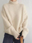 Switch Women&#39;s loose turtleneck sweater in 100% pure cashmere, beige color, perfect for autumn/winter. 2 image