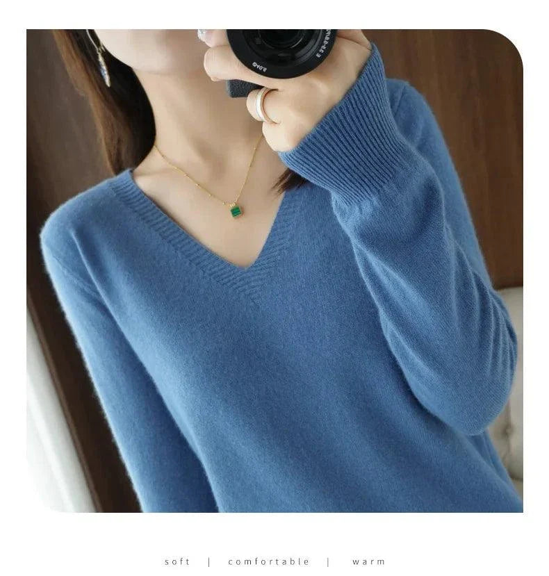 Cashmere women's V-neck pullover sweater with long sleeves, blue color, casual design.