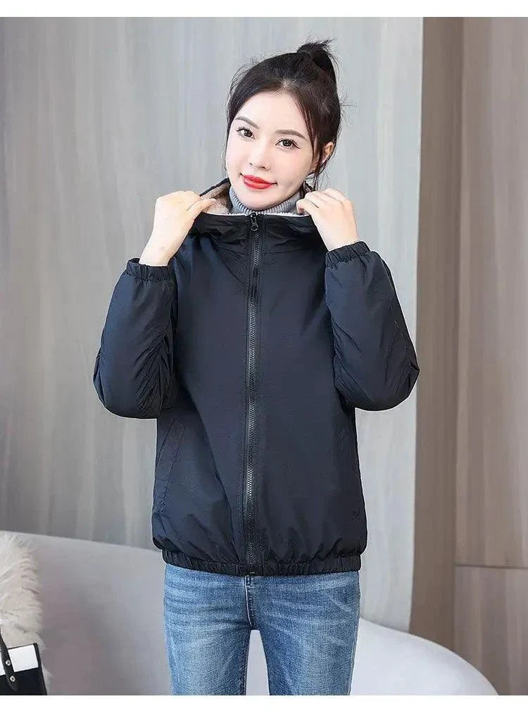 Women's winter fleece hooded jacket, windproof and stylish, ideal for casual outdoor activities and cold weather comfort.