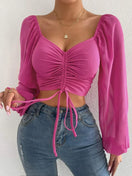 Switch Chic Summer V-Neck Crop Tee with drawstring design in vibrant pink, perfect for casual summer outfits. 1 image