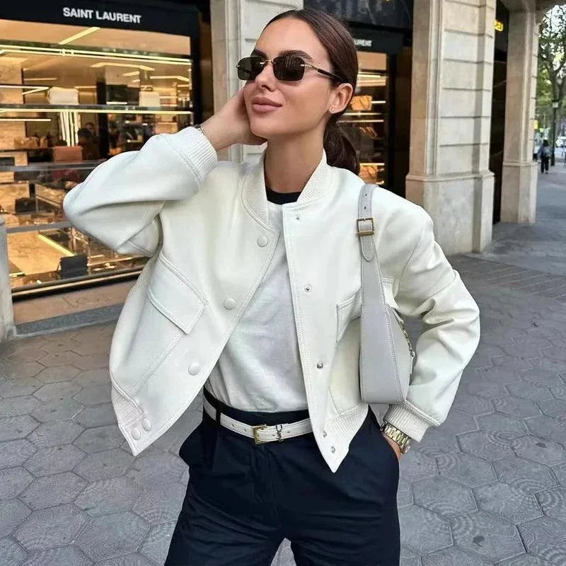 White women's cropped bomber jacket with button-front closure, aviator-inspired design, and long sleeves, perfect for autumn and winter.