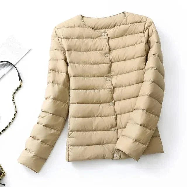 Ultralight warm women’s puffer jacket by Alfadarling, collarless design, O-neck, beige color.