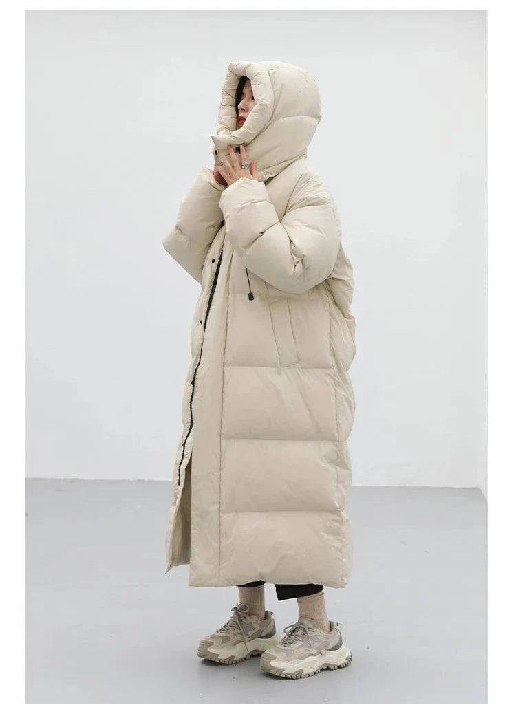 Women's down coat, Korean loose hooded long winter jacket, thick and warm with detachable hood, full-length sleeves, beige color.