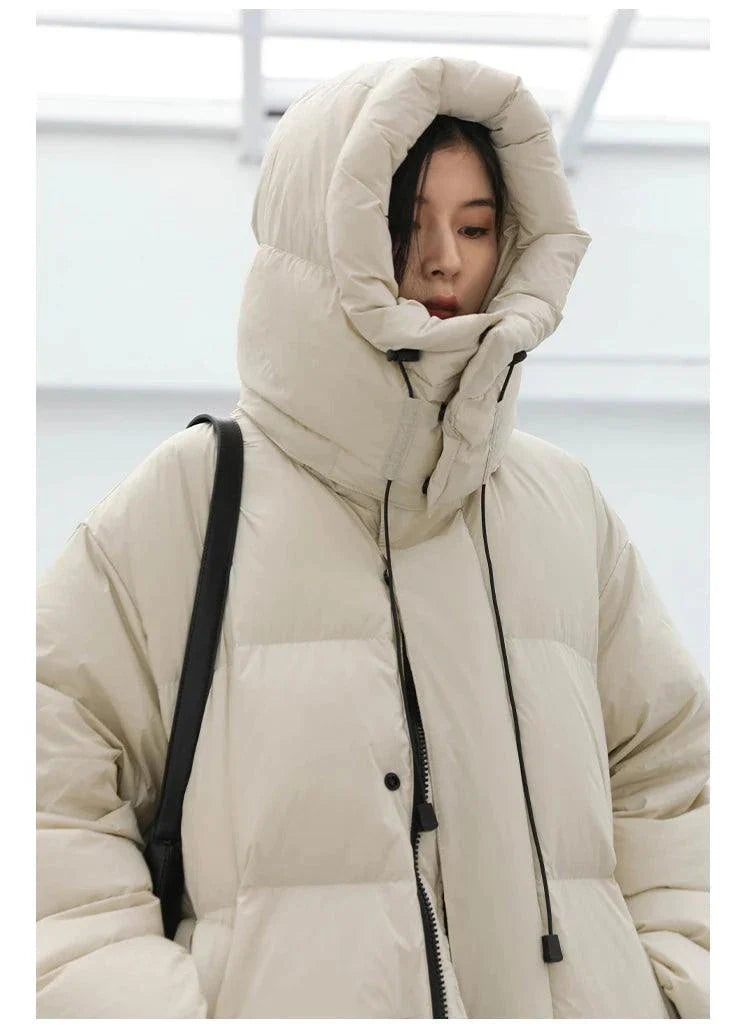 Korean loose hooded long winter coat for women, thick and warm.