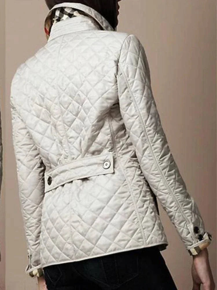 Quilted winter coat for women with turn-down collar and single-breasted design.